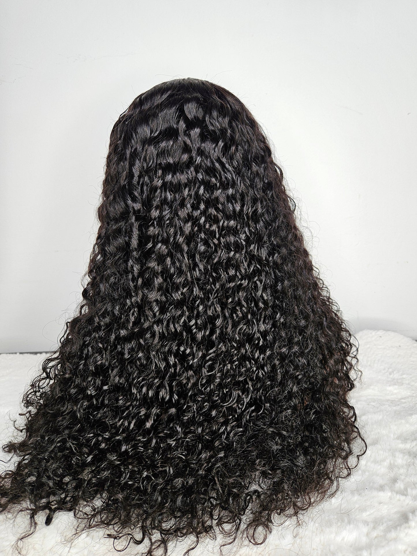 22” Deep Curly Wig – 5×5 HD Closure | Natural Black |